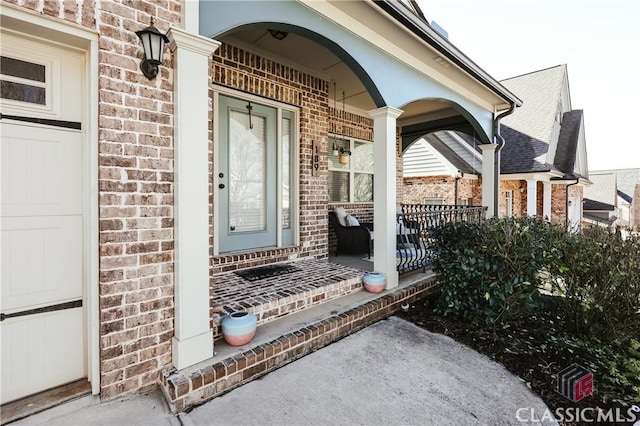 entrance to property with covered porch