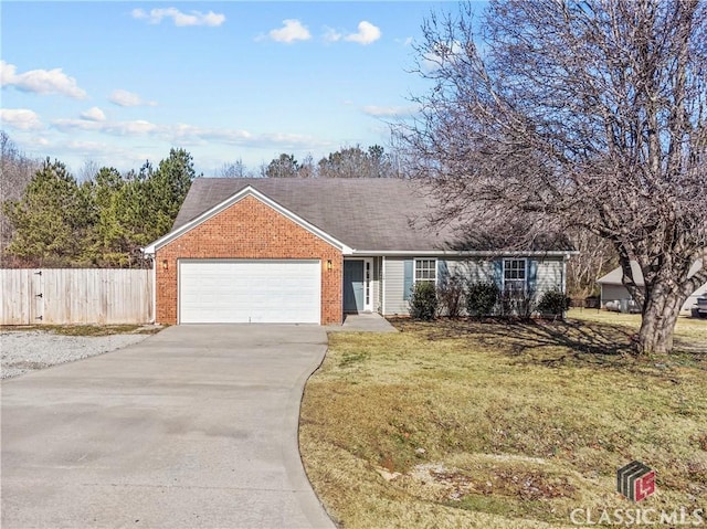 ranch-style home featuring a garage and a front lawn