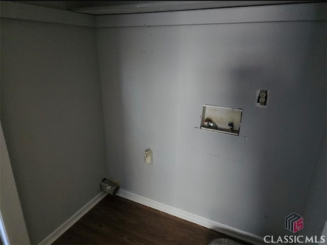 laundry room with dark wood-type flooring and hookup for a washing machine