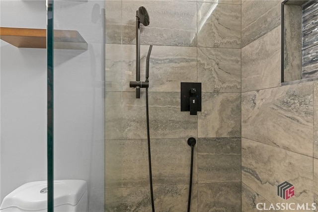 interior space with tiled shower