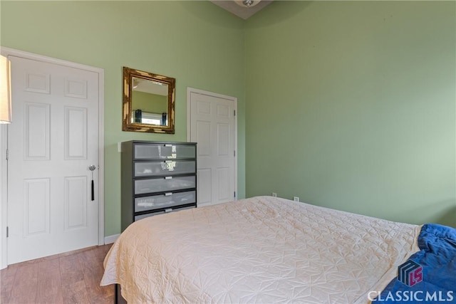 bedroom featuring hardwood / wood-style flooring