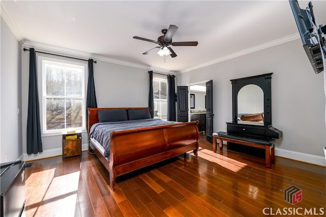 bedroom featuring dark wood-type flooring, ornamental molding, and ceiling fan