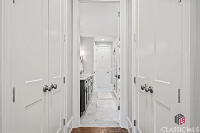 hall with light wood-type flooring