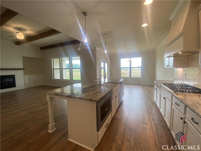 216 Montview Dr, Jefferson, GA 30549 - kitchen with baseboards, ceiling fan, dark wood-type flooring, white cabinetry, and recessed lighting
