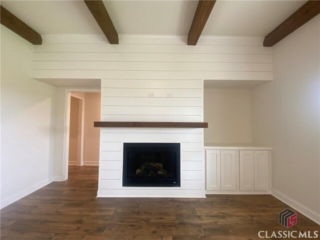 216 Montview Dr, Jefferson, GA 30549 - detailed view of beam ceiling, wood finished floors, a large fireplace, and baseboards