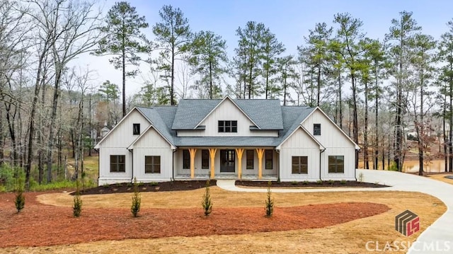 modern farmhouse style home with covered porch