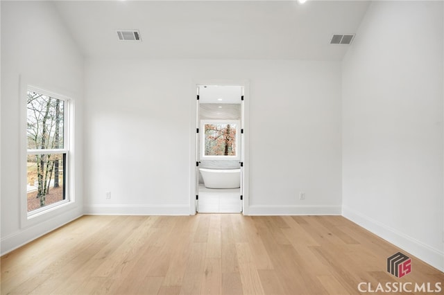 unfurnished room featuring light hardwood / wood-style flooring