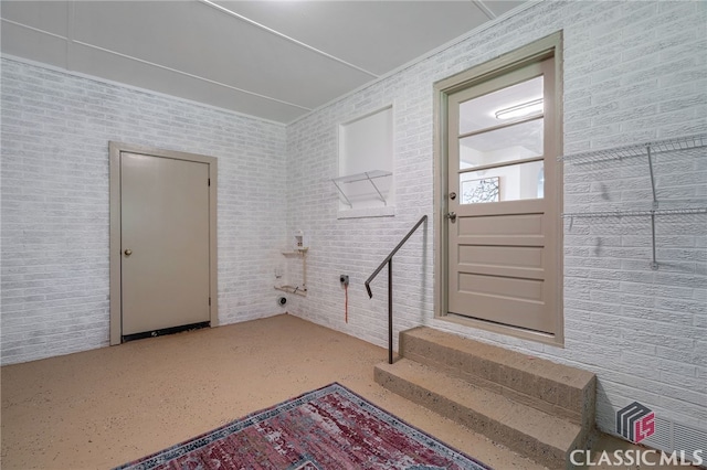 entryway featuring concrete floors