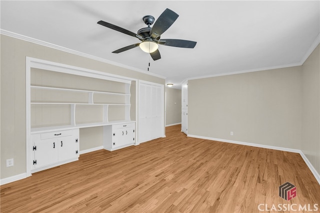 unfurnished living room featuring ornamental molding, light wood-type flooring, built in study area, and baseboards