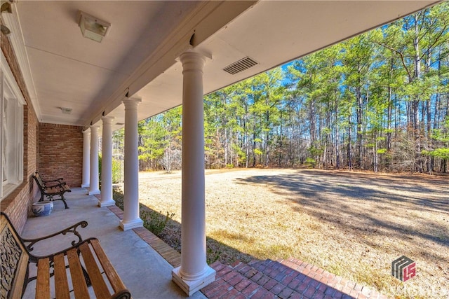 view of patio with a porch and visible vents