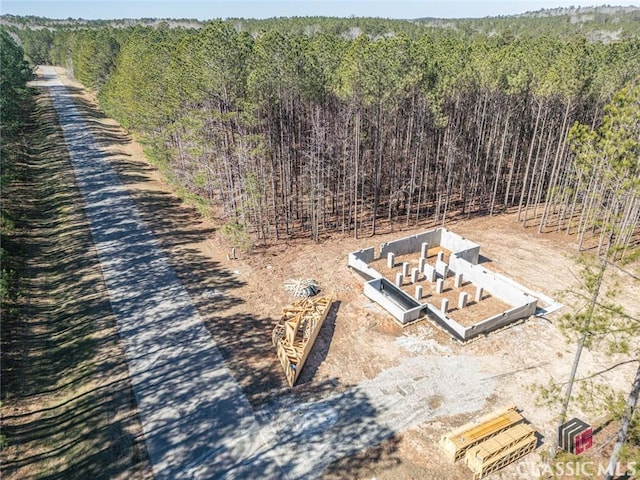 drone / aerial view with a forest view