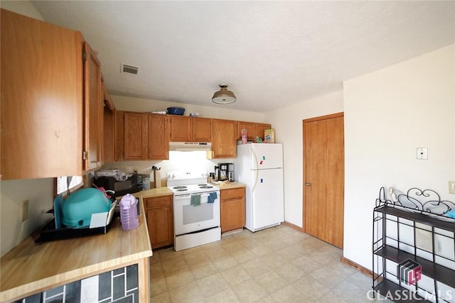 kitchen with white appliances