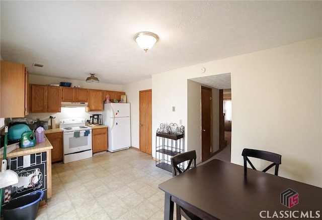 kitchen featuring white appliances