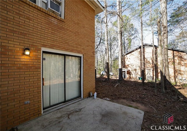 view of home's exterior featuring a patio