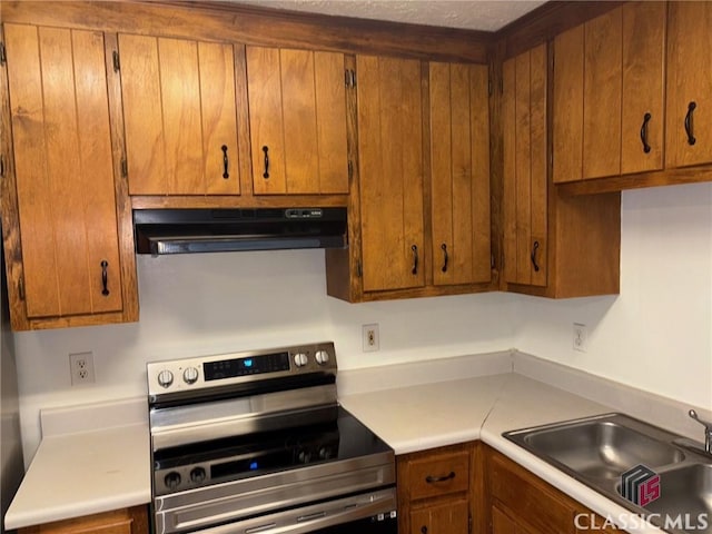 kitchen with sink and stainless steel electric range oven