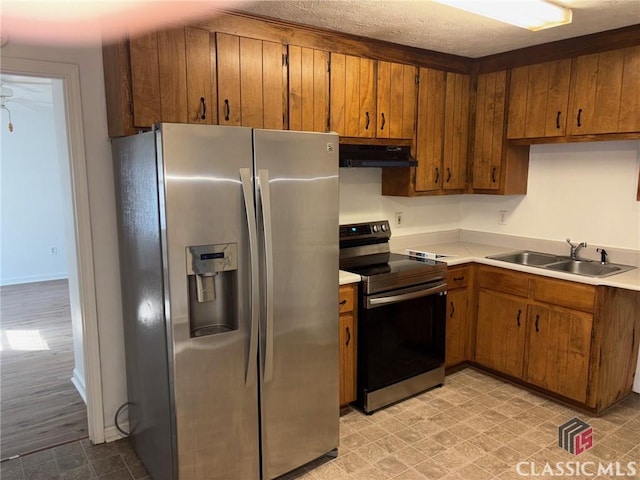 kitchen with stainless steel appliances and sink