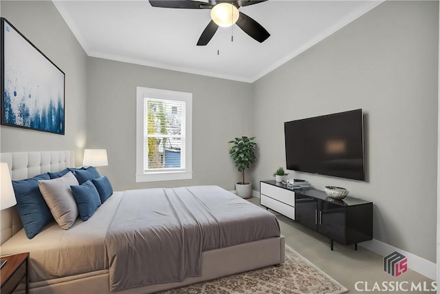 bedroom featuring ornamental molding, light carpet, baseboards, and a ceiling fan