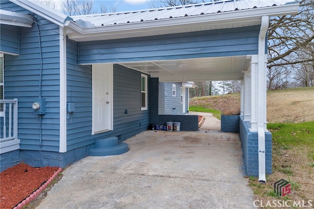 view of patio featuring a carport