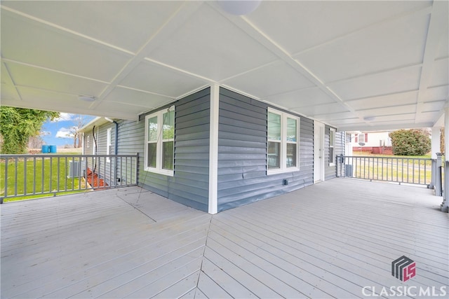 wooden terrace with central AC unit