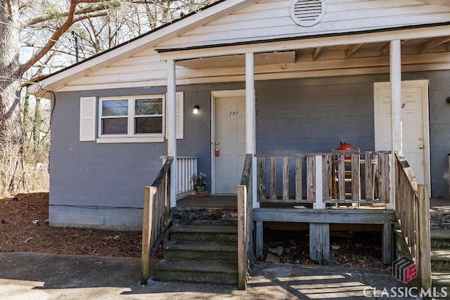 entrance to property with covered porch