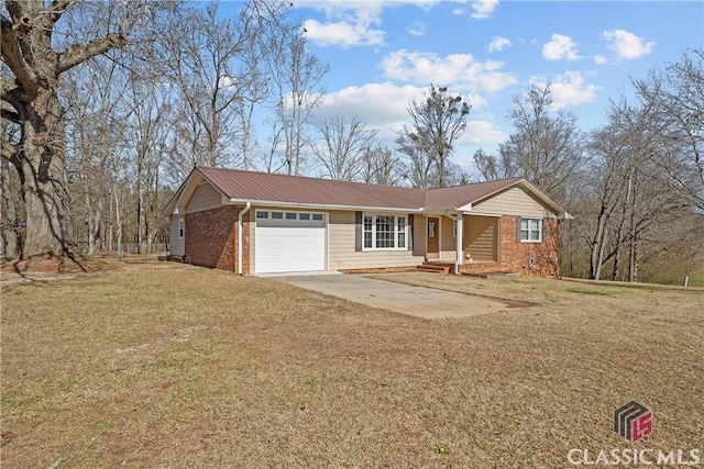 single story home with a front lawn, brick siding, driveway, and an attached garage