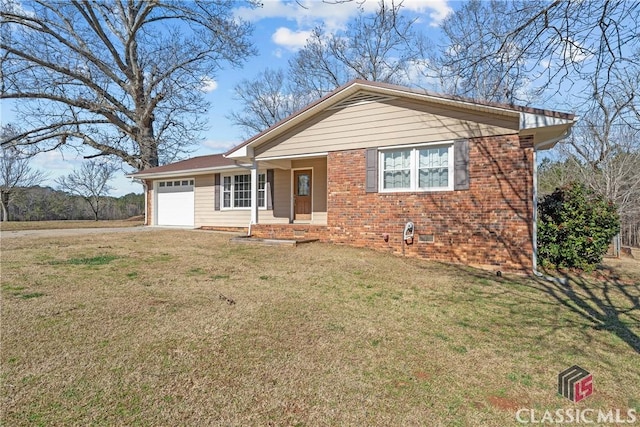 view of front of property featuring brick siding, a front yard, crawl space, a garage, and driveway