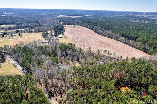 bird's eye view with a forest view