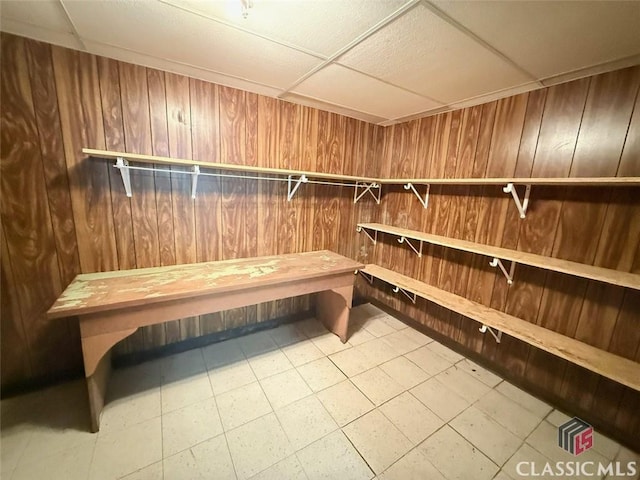 walk in closet featuring a drop ceiling