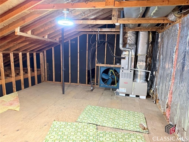 attic featuring heating unit