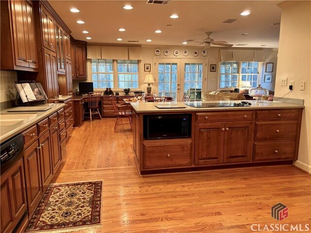 hall with light wood-style flooring