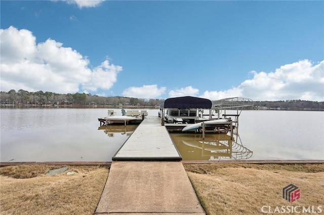 view of dock with a water view