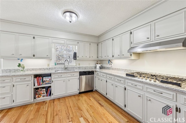 kitchen with open shelves, stainless steel appliances, white cabinetry, a sink, and under cabinet range hood