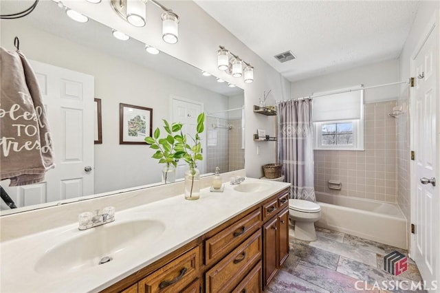 bathroom featuring toilet, shower / bath combination with curtain, a sink, and visible vents