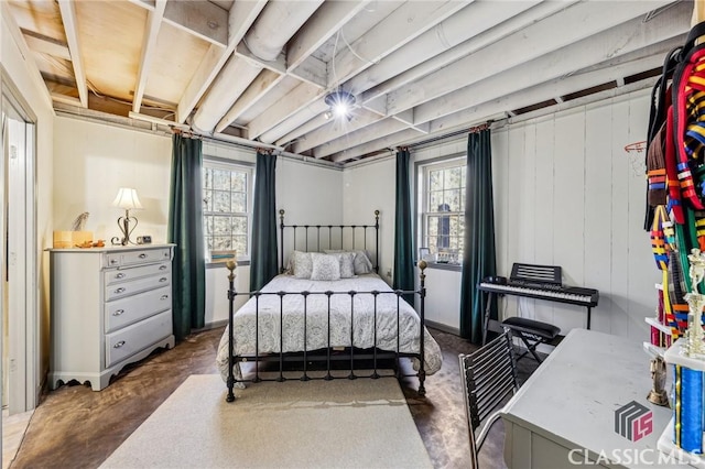 bedroom with concrete floors