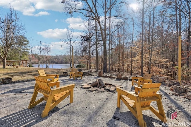 view of patio featuring a water view