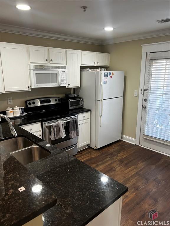 kitchen featuring ornamental molding, white appliances, white cabinetry, and a sink