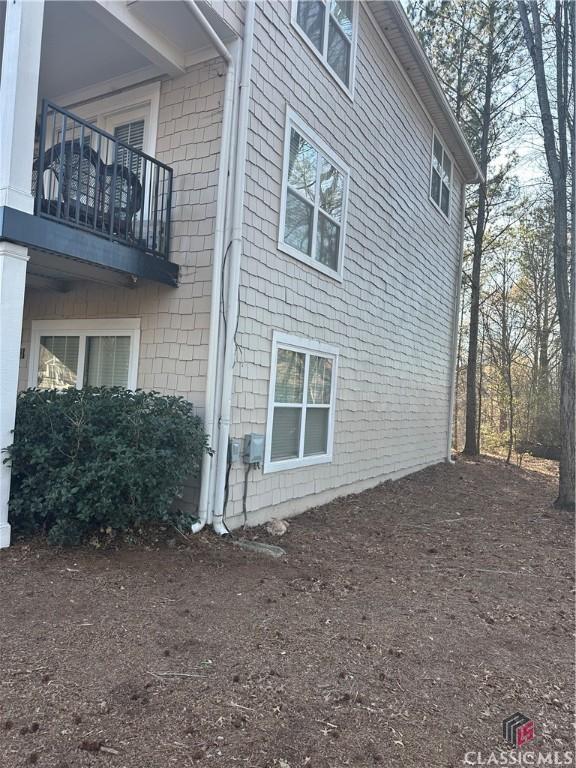 view of property exterior featuring a balcony