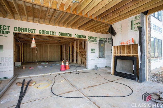 miscellaneous room featuring exterior fireplace