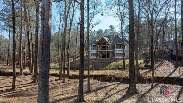 view of front of home with a chimney