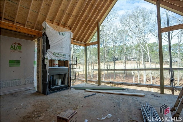 interior space featuring vaulted ceiling