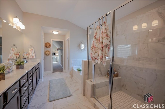 full bath with a stall shower, lofted ceiling, a garden tub, and vanity