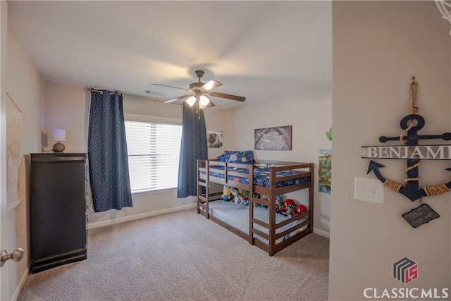 bedroom featuring carpet floors, ceiling fan, and baseboards