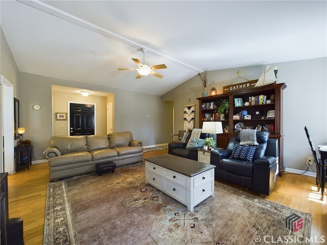 living room featuring vaulted ceiling with beams, a ceiling fan, baseboards, and wood finished floors