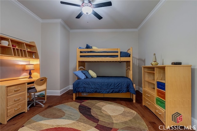 bedroom with ornamental molding, wood finished floors, built in study area, and baseboards