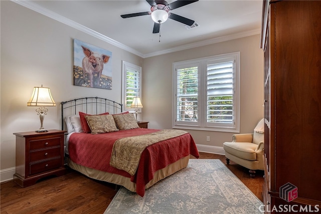 bedroom with ceiling fan, dark wood-style flooring, visible vents, baseboards, and ornamental molding