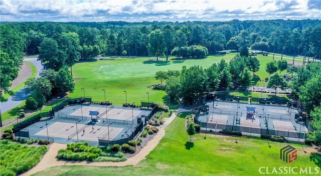 aerial view featuring a wooded view