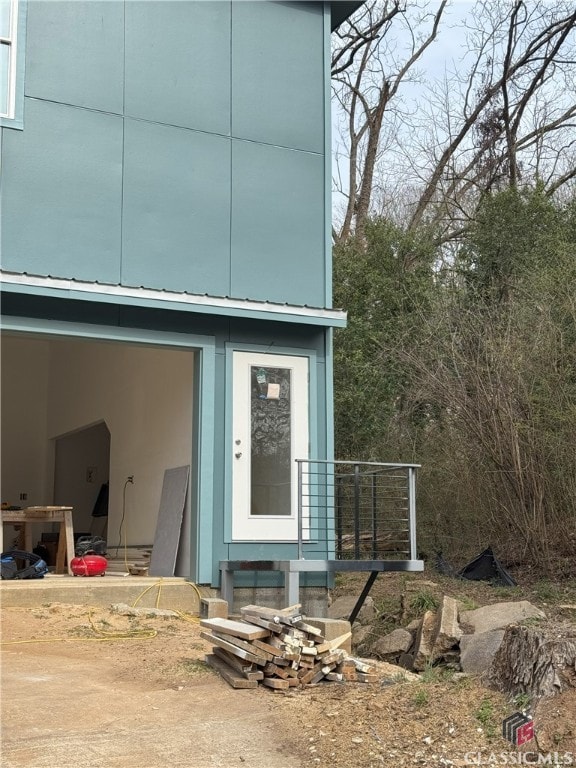 property entrance with metal roof