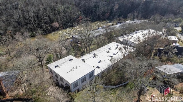 aerial view featuring a view of trees