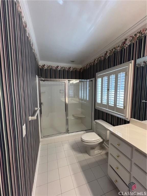 full bathroom with a stall shower, crown molding, toilet, and wallpapered walls