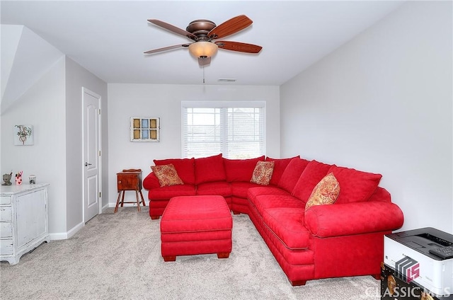 living room with ceiling fan, carpet floors, visible vents, and baseboards